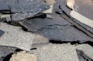 Roof Replacement Considerations for Brittle Asphalt Shingles